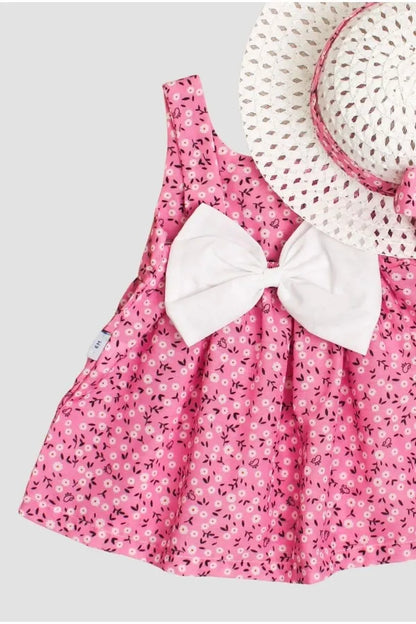 Robe rose avec nœud papillon pour fille coordonnée à un chapeau élégant
