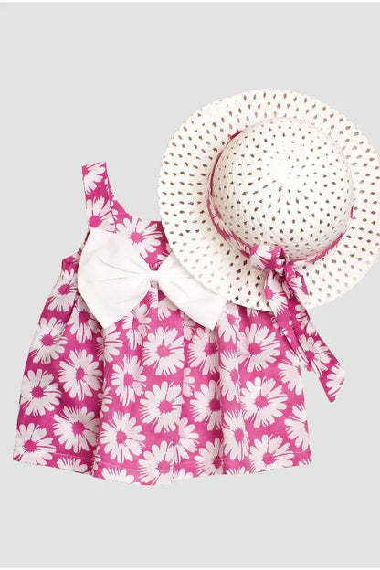 Robe fille rose avec motifs fantaisie et chapeau élégant