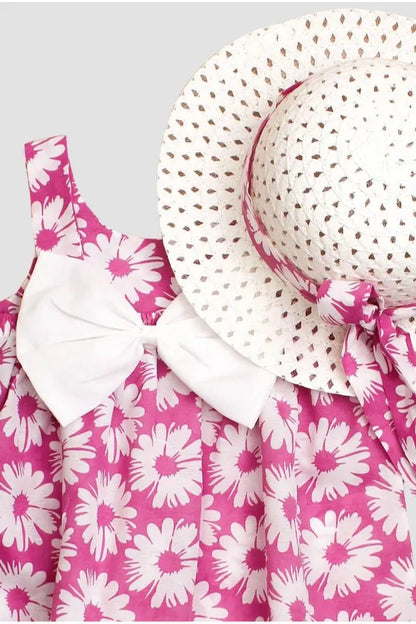 Robe fille rose avec motifs fantaisie et chapeau élégant