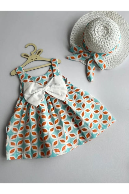 Robe pour fille décorée d'un corsage orange et d'un chapeau élégant